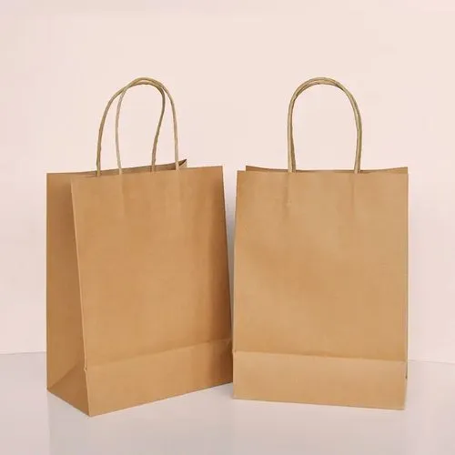 عدد 100 شنطة كرافت مقاس 32*36 